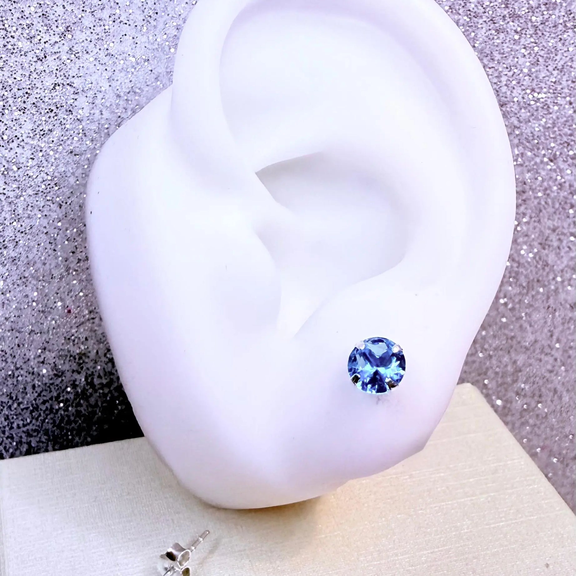 Aros dama circón celeste Plata fina ley 925