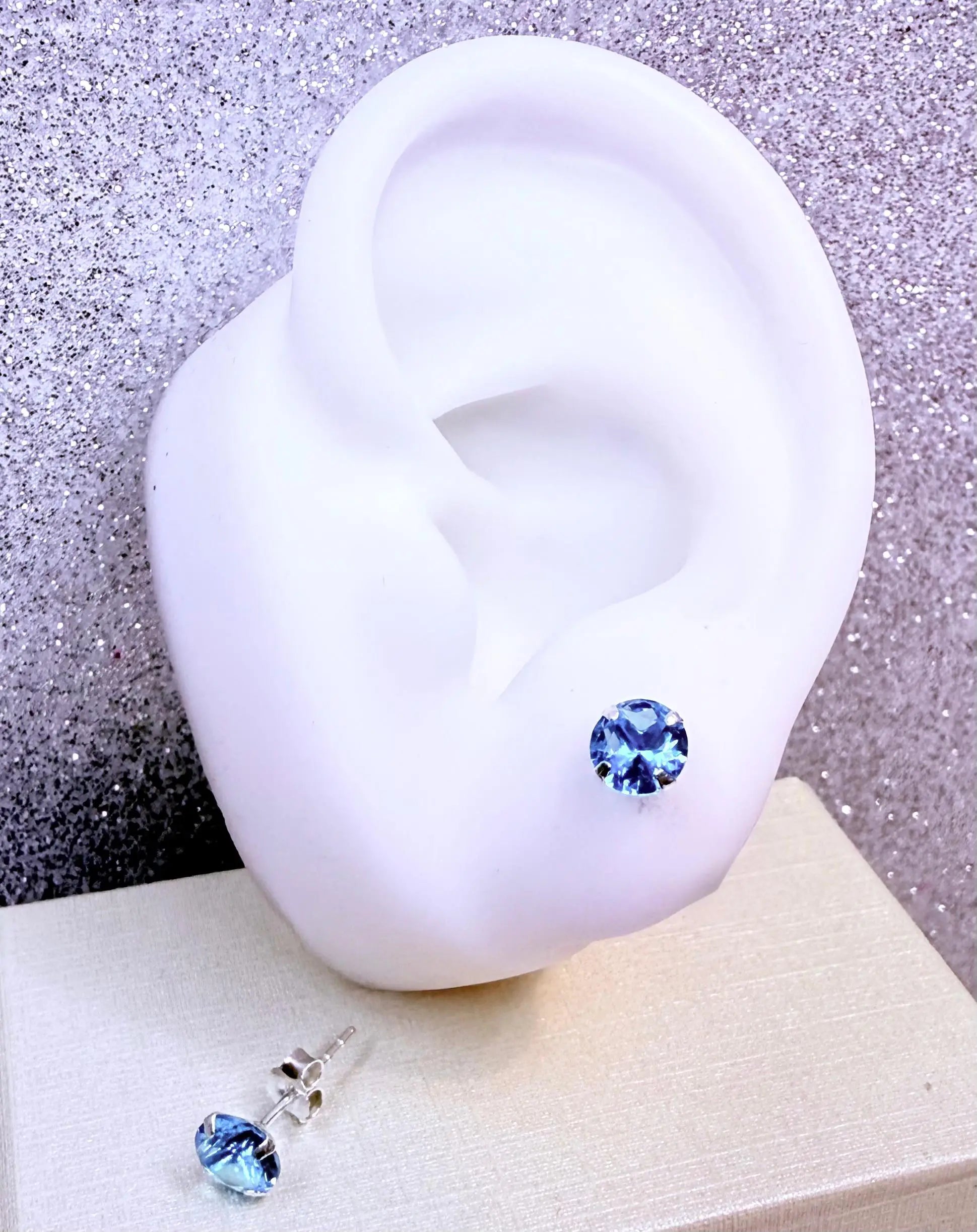 Aros dama circón celeste Plata fina ley 925