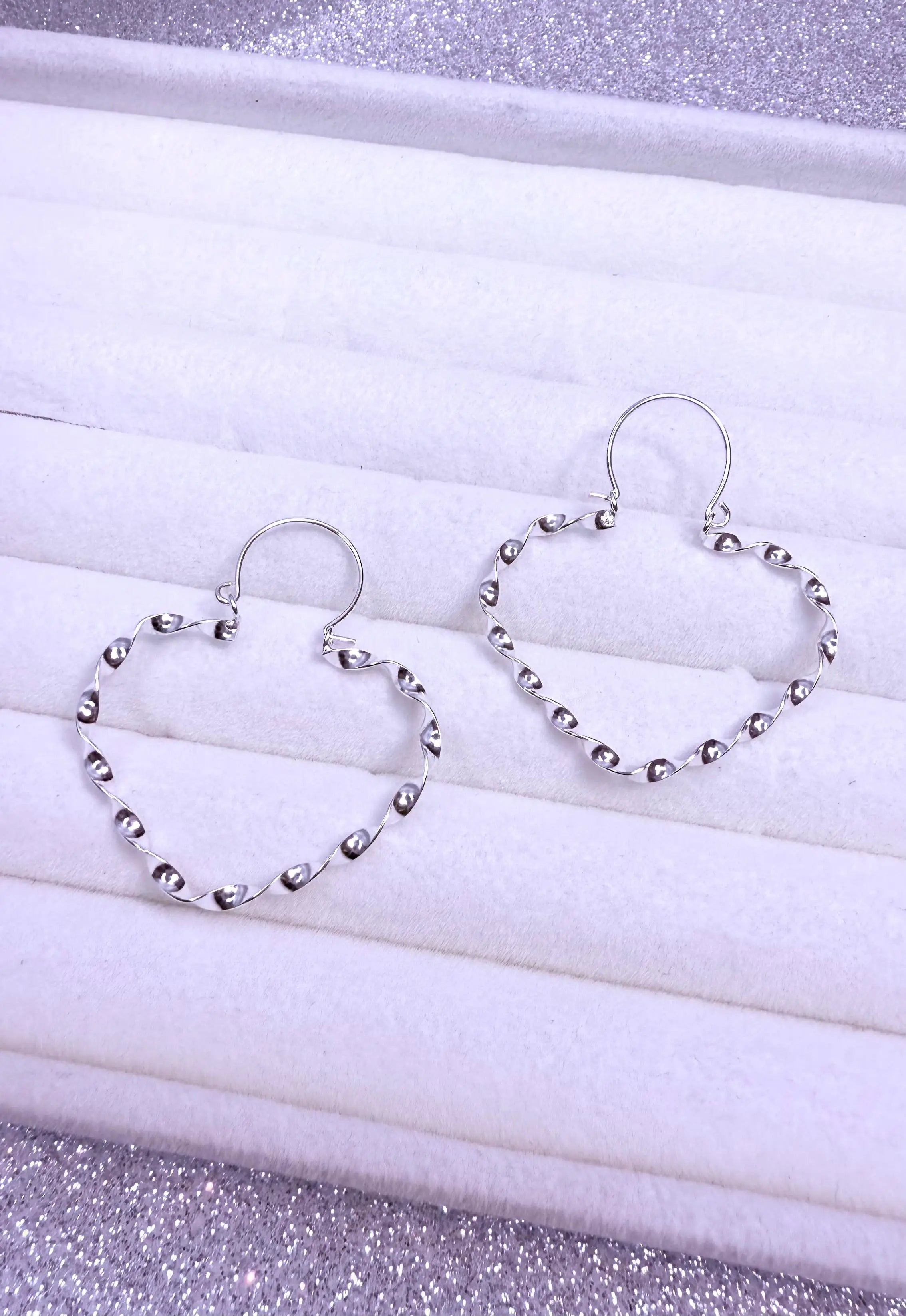 Aros dama argolla diseño corazón entorchado Plata fina ley 925