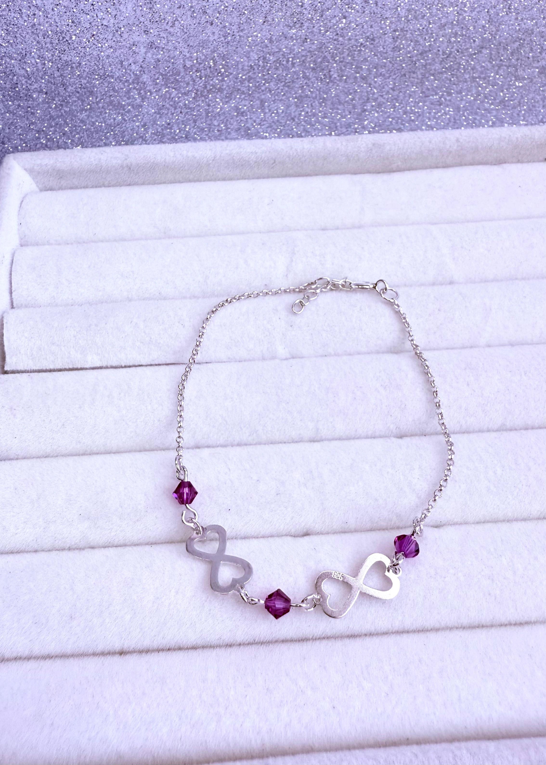 Pulsera Dama Diseño Infinito con cristales fucsia Plata fina ley 925
